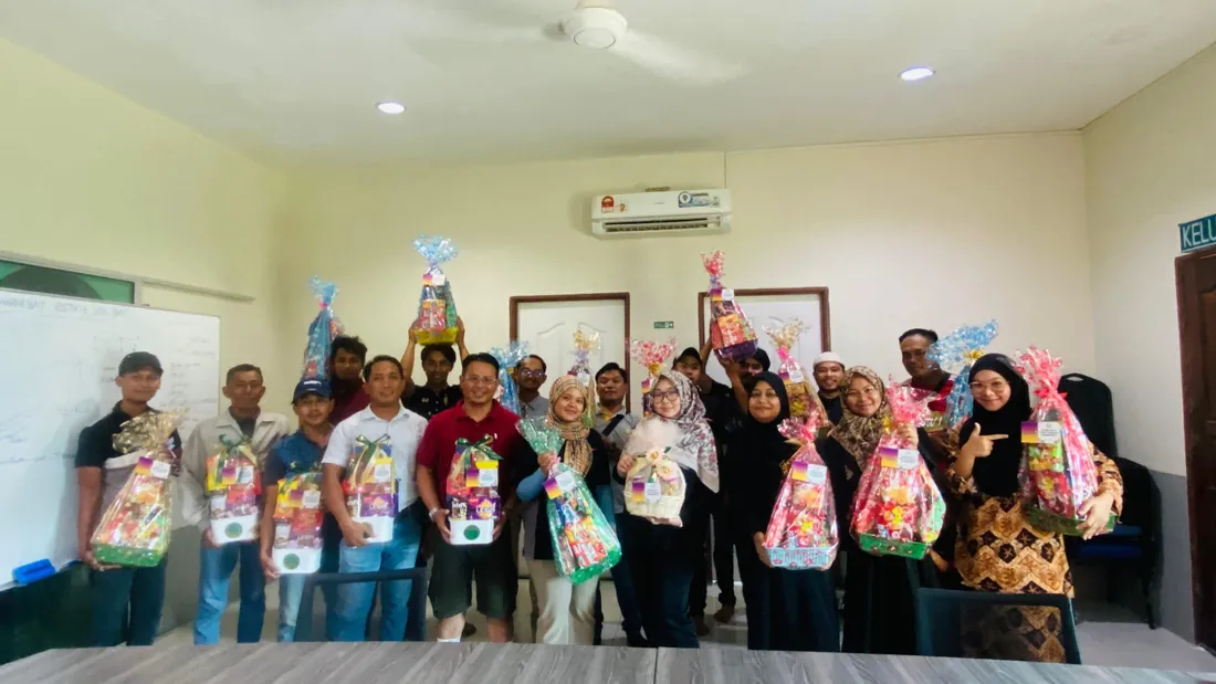 Staff with their Hari Raya hampers, 2026